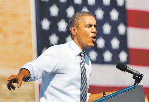 President Barack Obama touts his American Jobs Act in a speech Sept. 27 at Abraham Lincoln High School in Denver. (Joe Amon, The Denver Post)